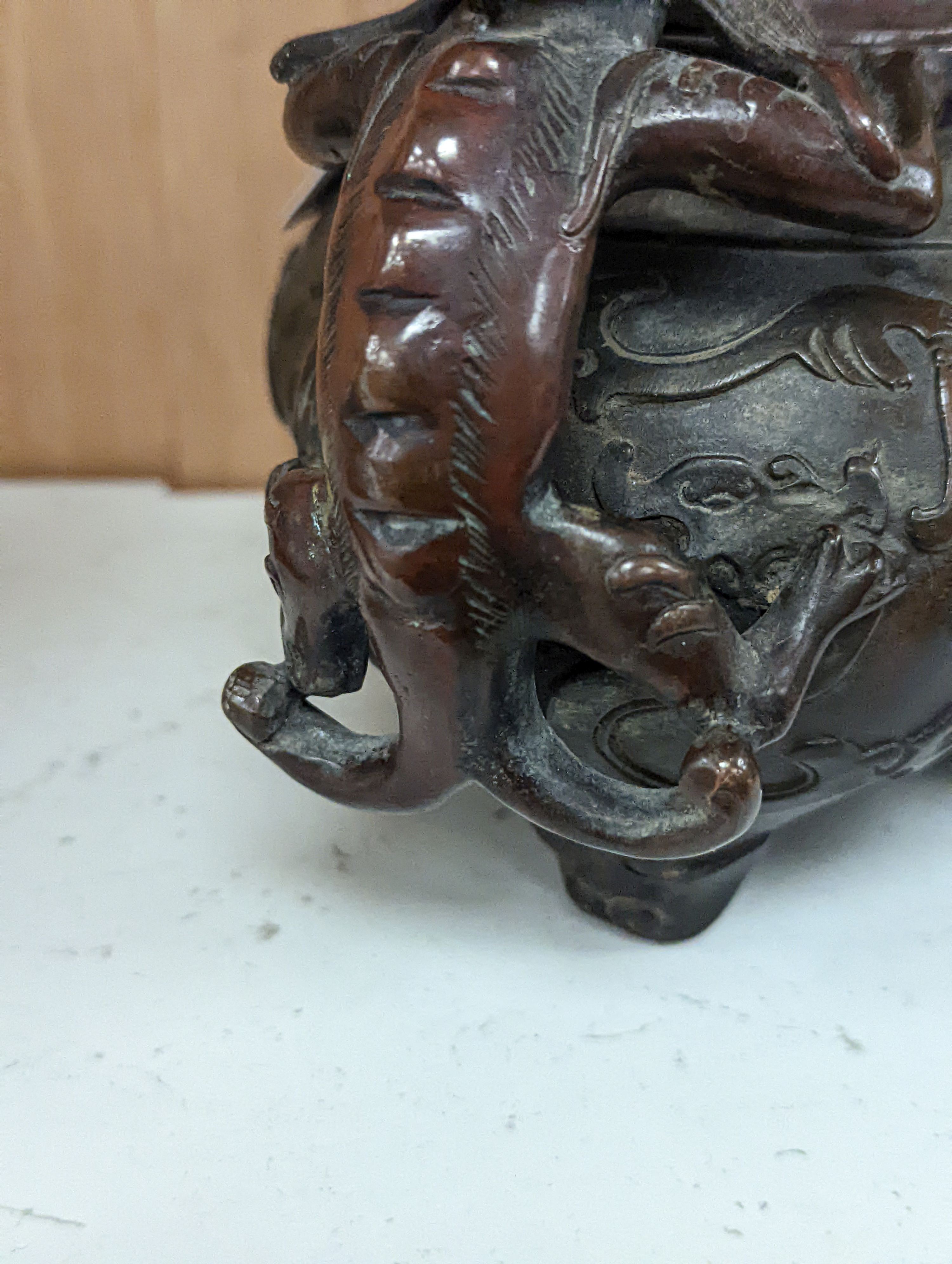 A 19th century Chinese bronze quatrefoil censer, with four character mark - 19cm high